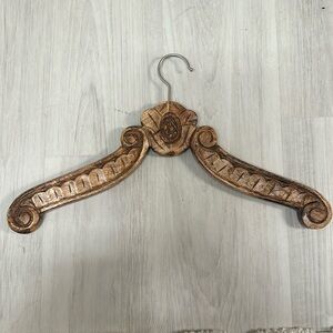 Hand carved wooden hanger